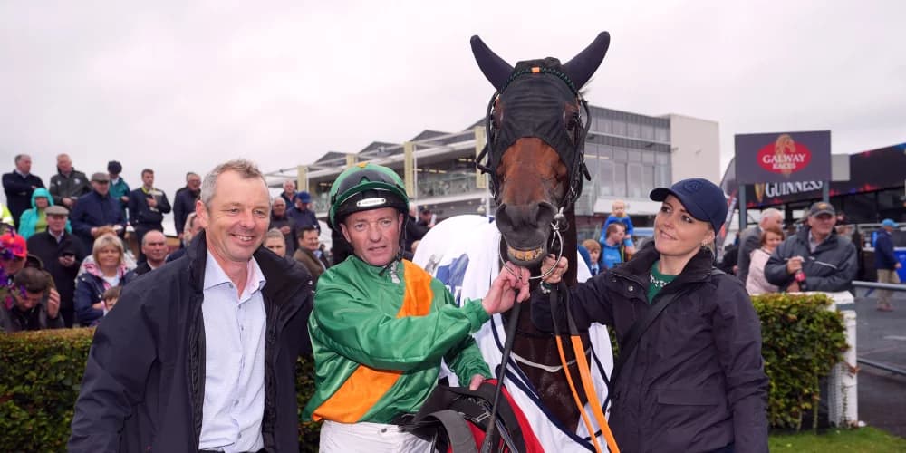 Micky Fenton celebrating with big handicap winner at Galway