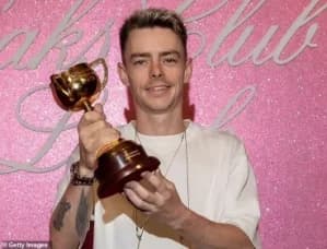 Jockey Robbie Dolan Celebrates Melbourne Cup Win with Ronan Keating