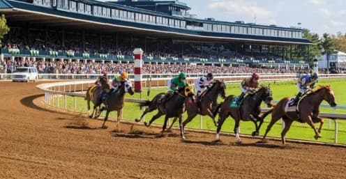 "Trainer Sims Achieves Milestone with Keeneland Victory"